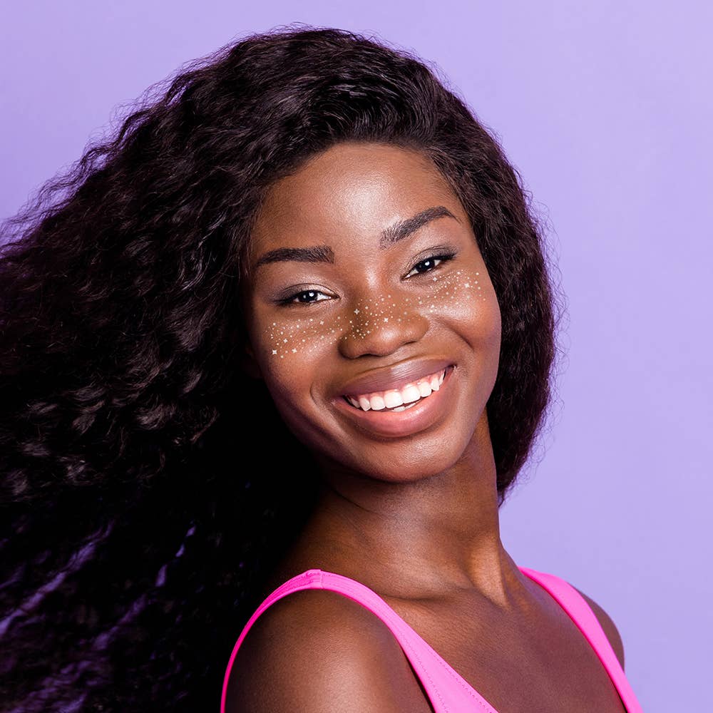 Silver Face Freckles Tattoo