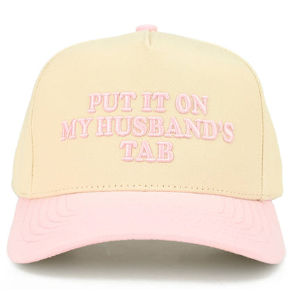 Put it on my Husbands Tab Trucker Hat