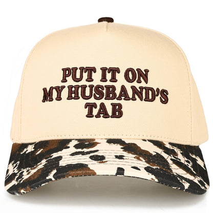 Put it on my Husbands Tab Trucker Hat