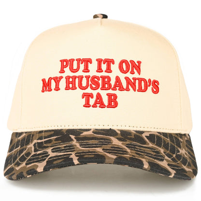 Put it on my Husbands Tab Trucker Hat