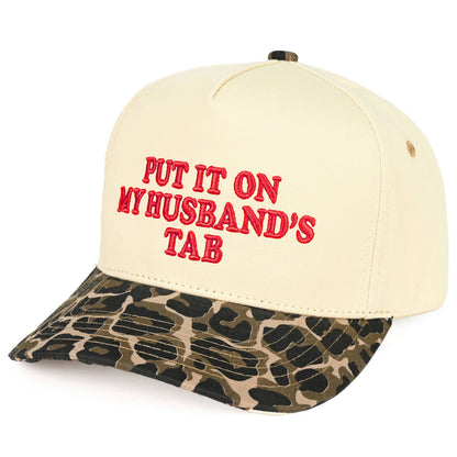 Put it on my Husbands Tab Trucker Hat